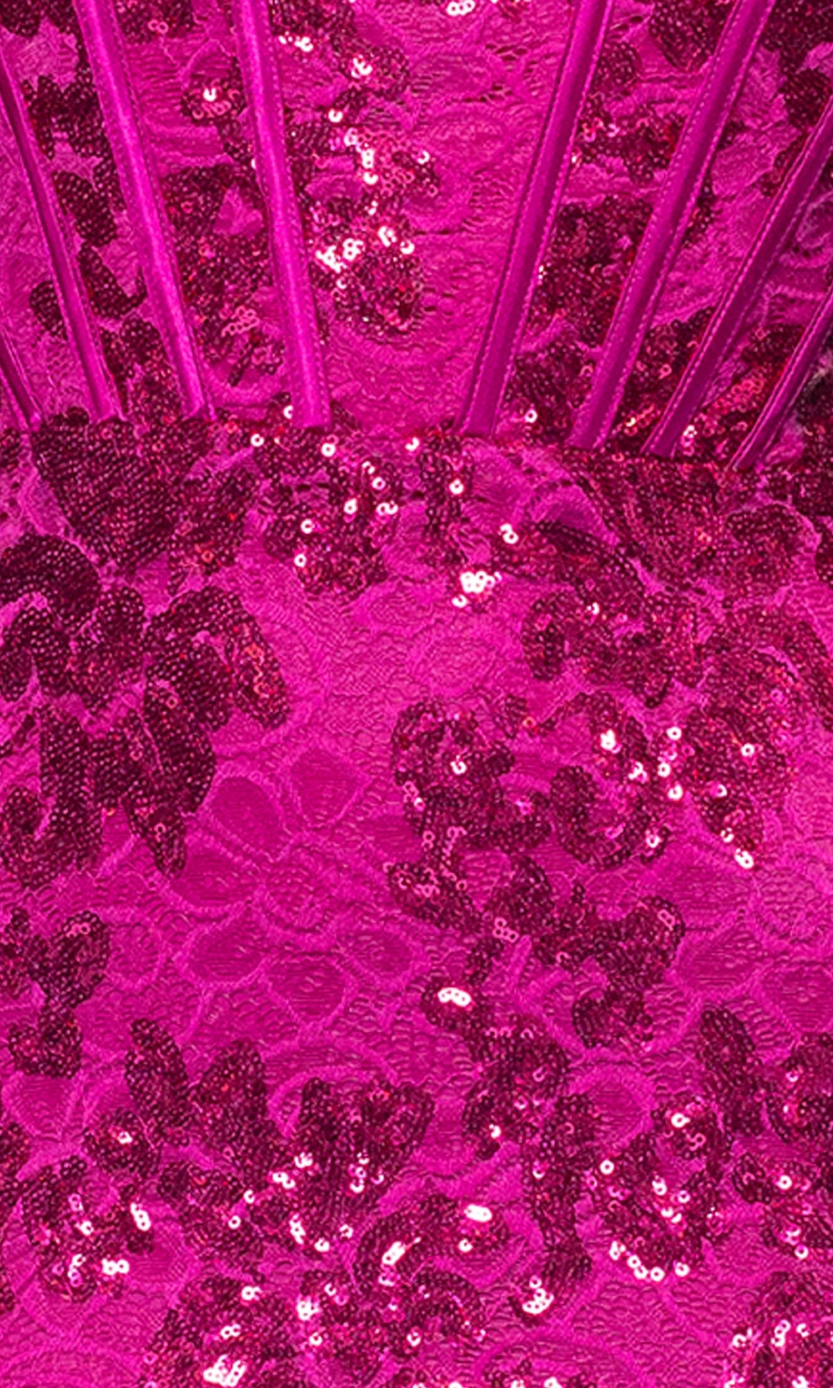 Close-up of the Hot Pink Sequin Prom Gown, Blondie Nites 5247BN, showing lace, sequins with floral patterns, and vertical boning details.
